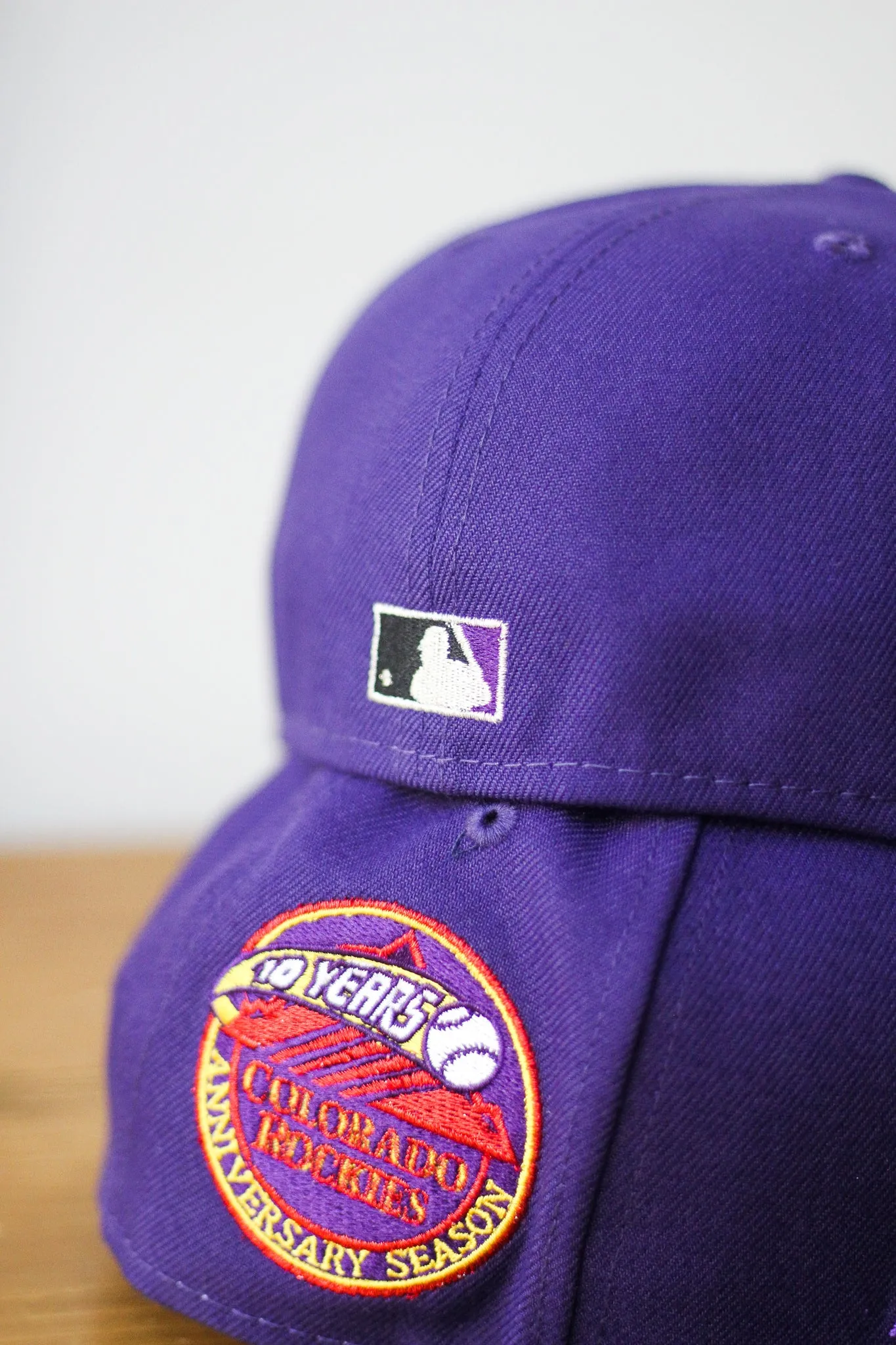 10TH ANNIVERSARY COLORADO ROCKIES PURPLE FITTED W/ GREY UNDER VISOR