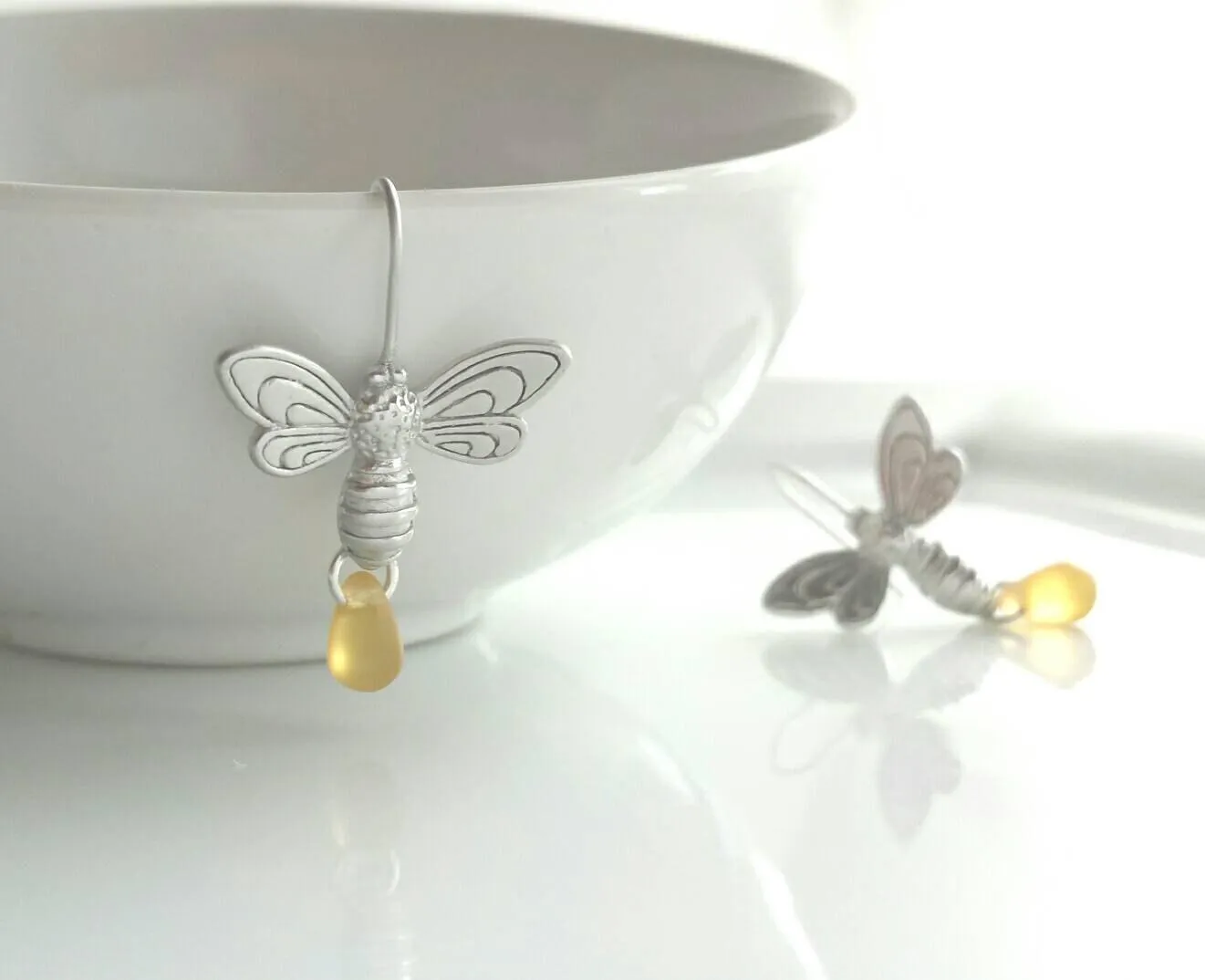 Bee Earrings - silver matte finish flying honeybee hooks with small simple glass honey drop dangle - fresh from the hive - bumblebee buzz