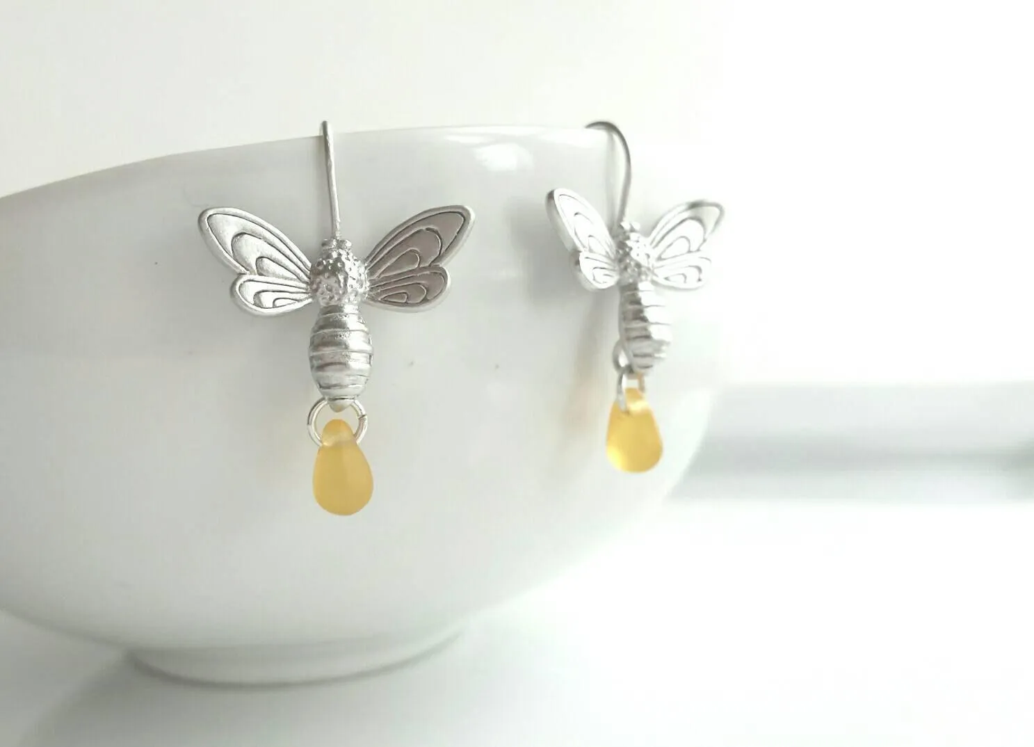 Bee Earrings - silver matte finish flying honeybee hooks with small simple glass honey drop dangle - fresh from the hive - bumblebee buzz
