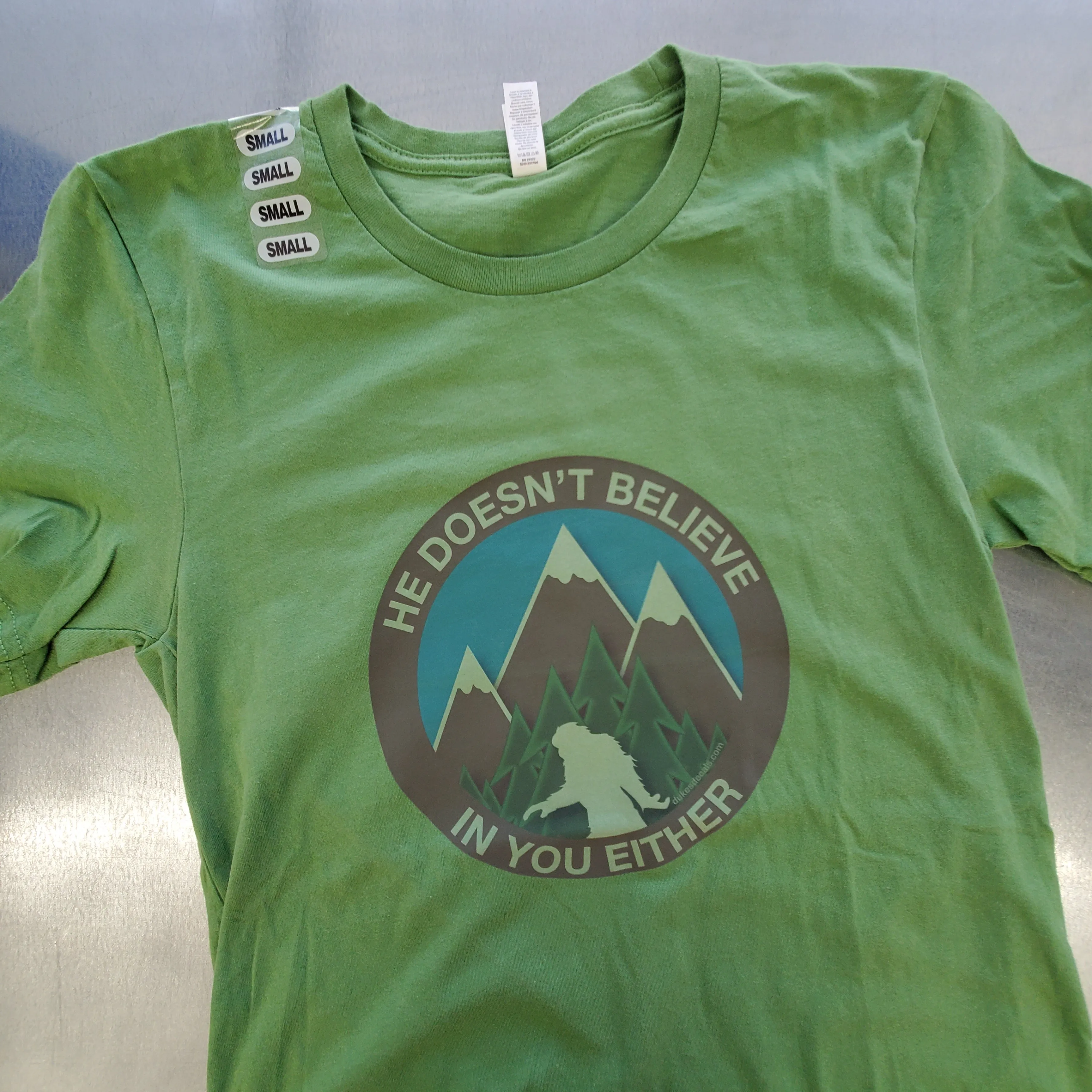 He Doesn't Believe In You Either Bigfoot T-shirts