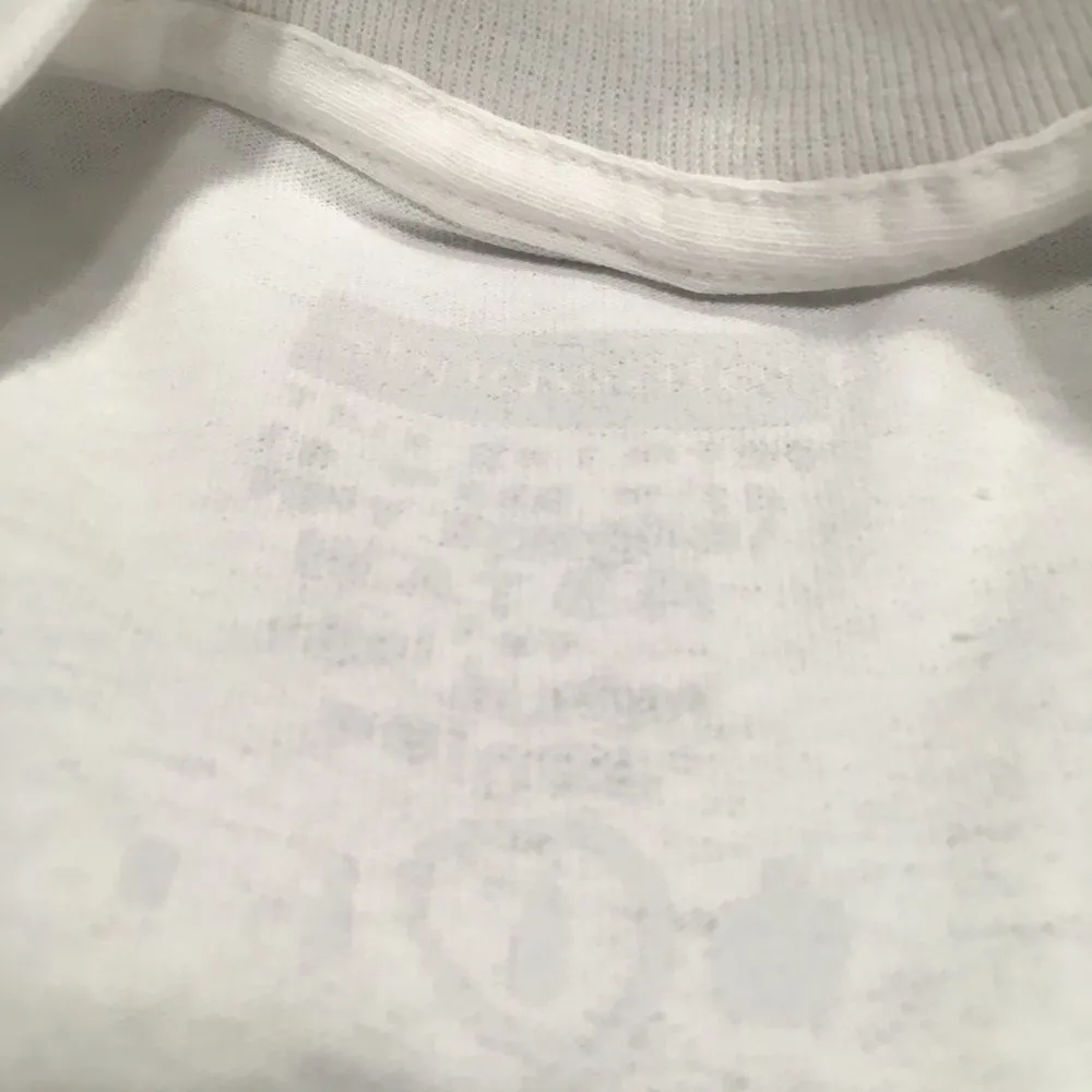 It stings the face T shirt white