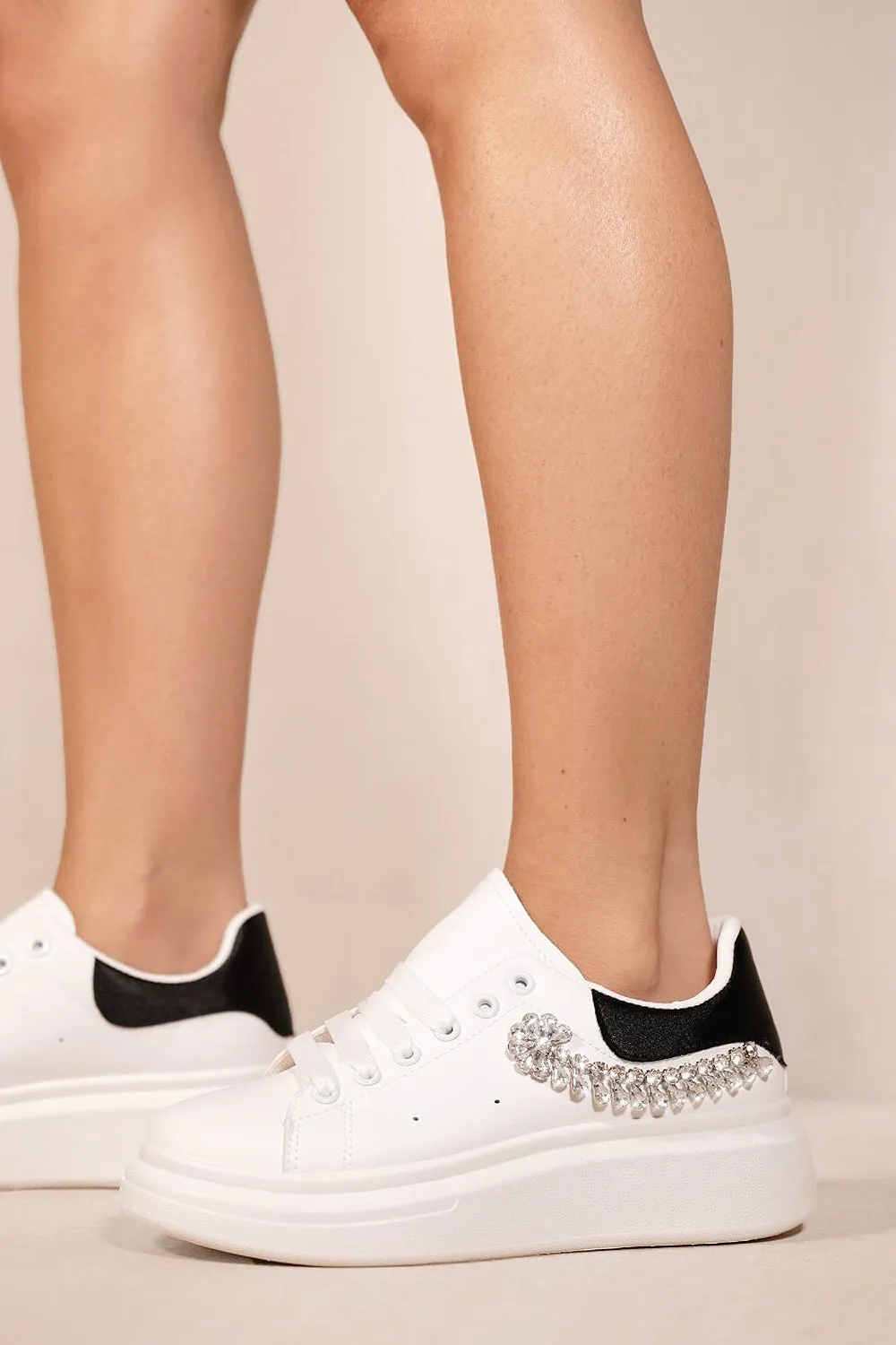 IZARA JEWEL EMBELLISHED CHUNKY SOLE TRAINERS IN BLACK FAUX LEATHER