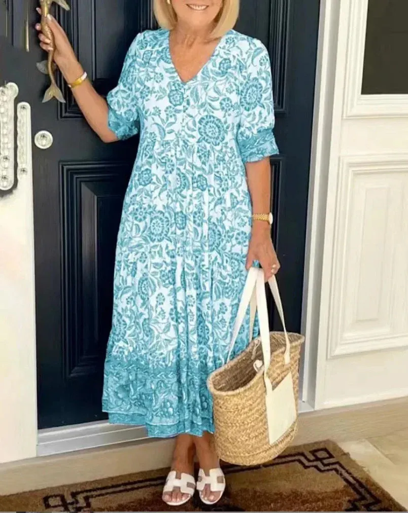 Jennica - Elegant floral dress with V-neckline