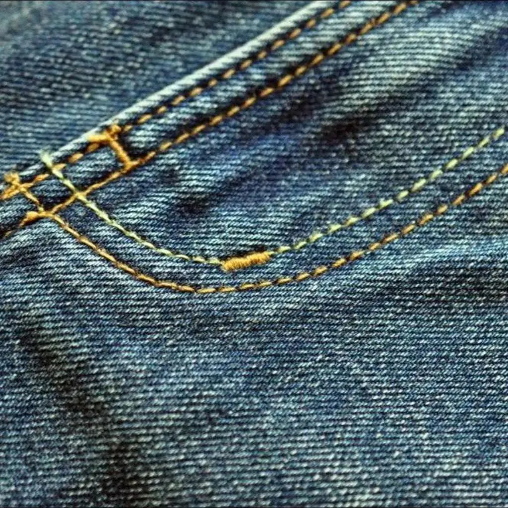 Sanded whiskered selvedge jeans for men