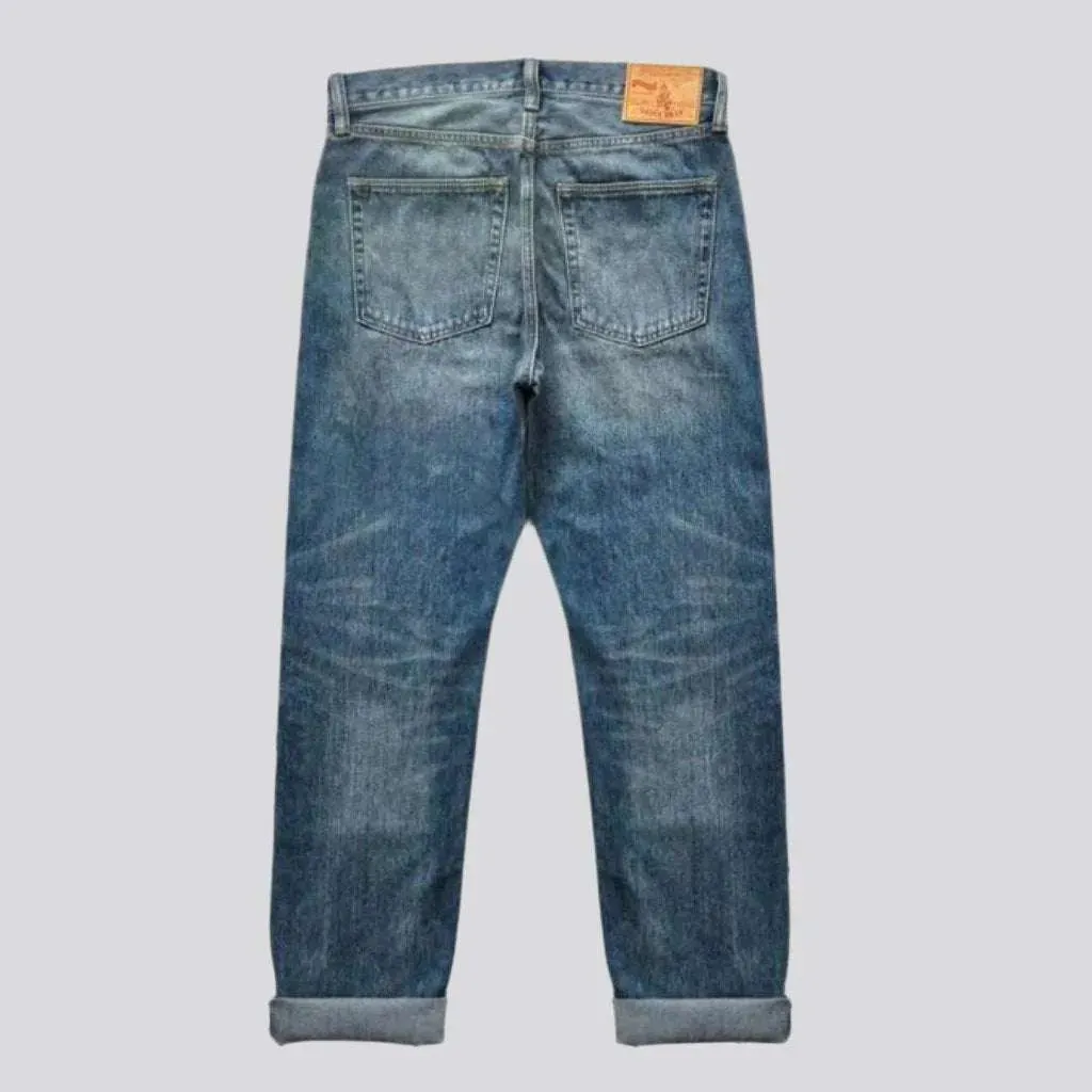 Sanded whiskered selvedge jeans for men