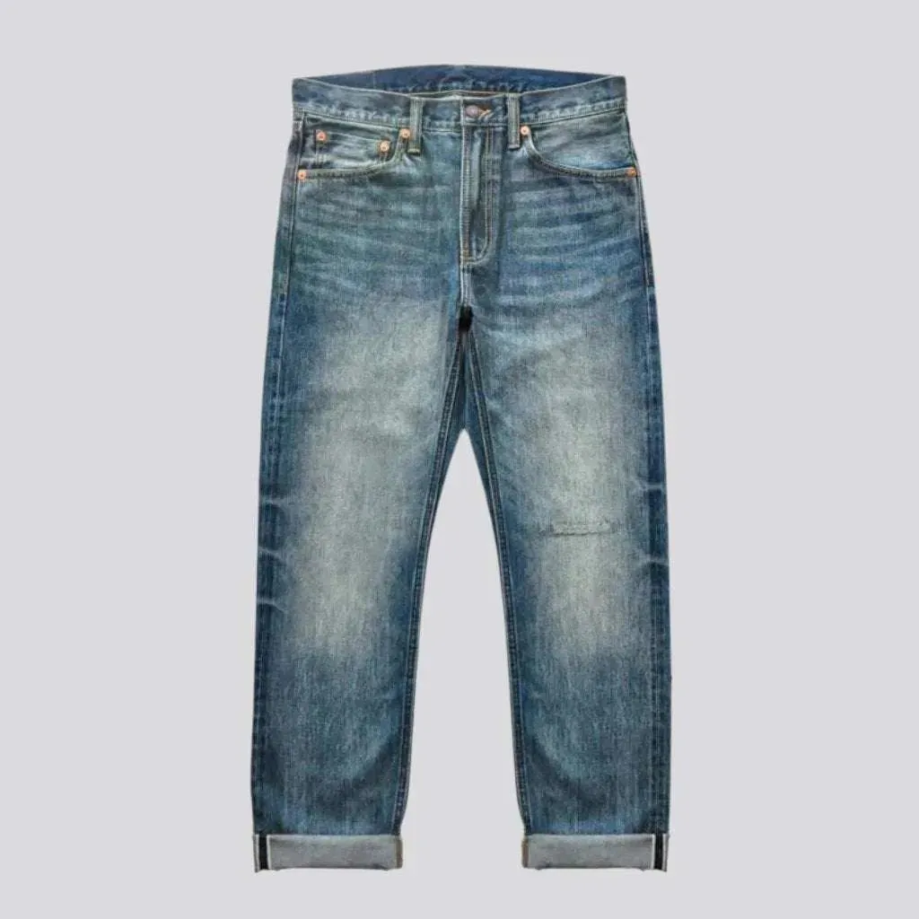 Sanded whiskered selvedge jeans for men